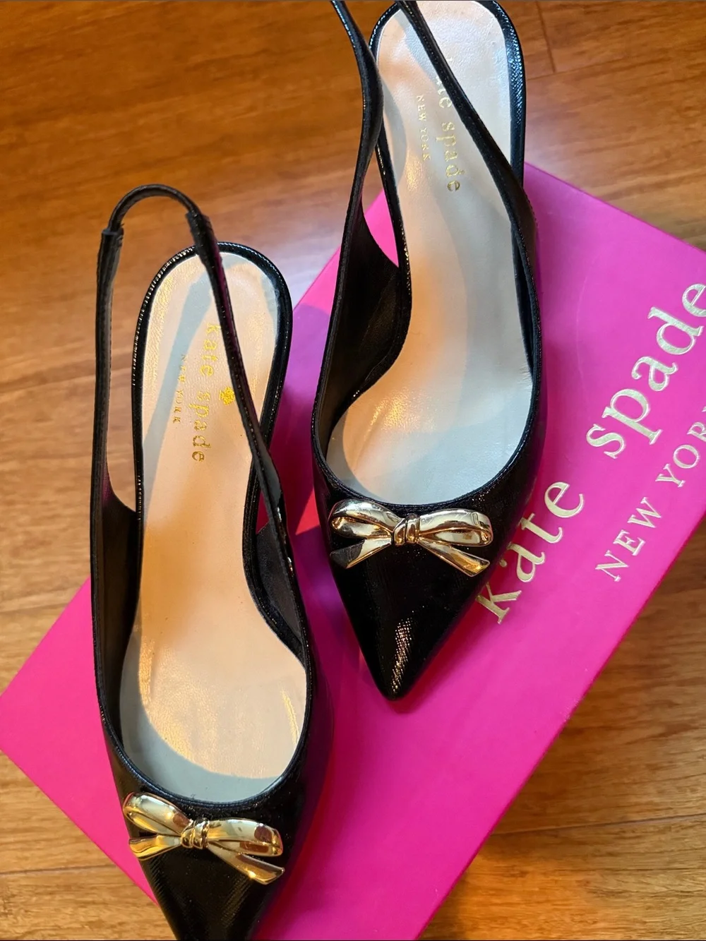 kate spade Black Patent Slingback Pumps with Gold Bow Accent